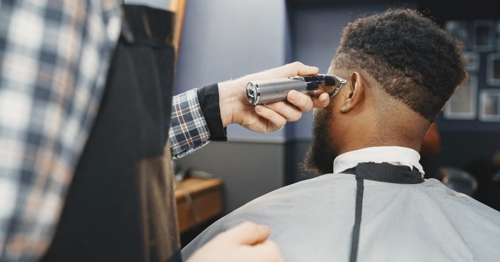Mid Taper Fade Guide: Styles & Face Shapes (2026) 2 Mid taper fade haircut with tapered sides and back
